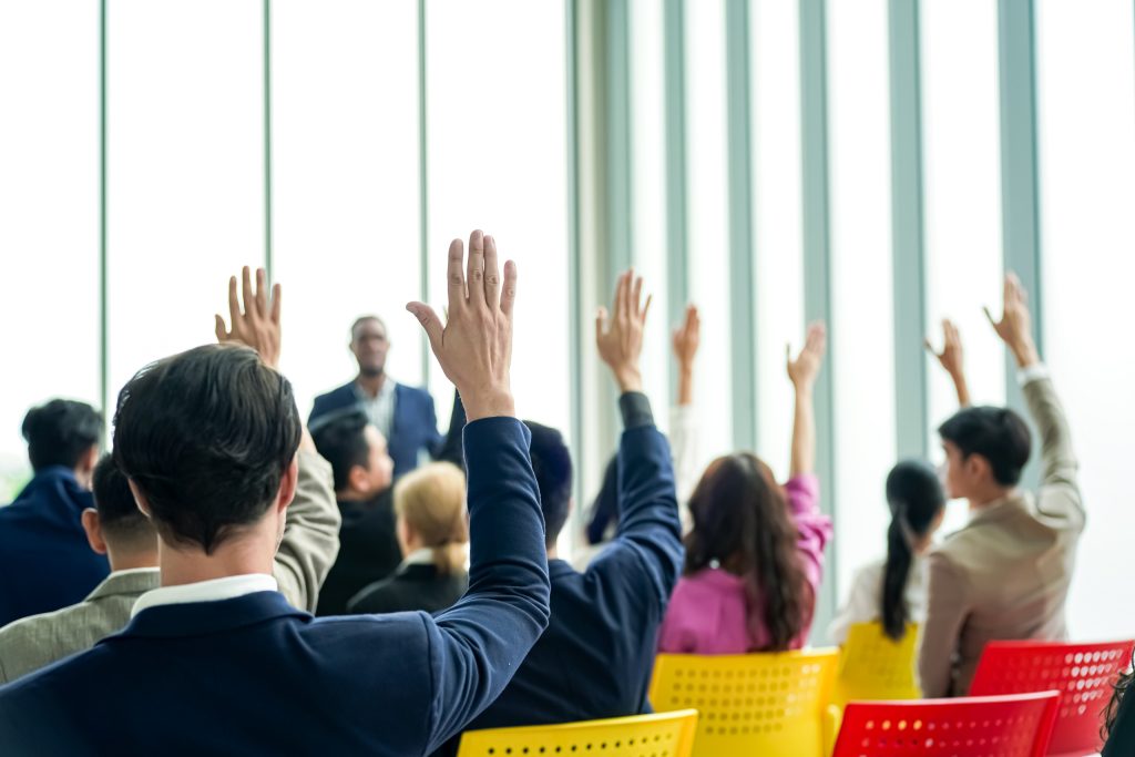 group-of-businesspeople-attending-a-seminar-2025-01-29-07-53-04-utc-scaled-1.jpg